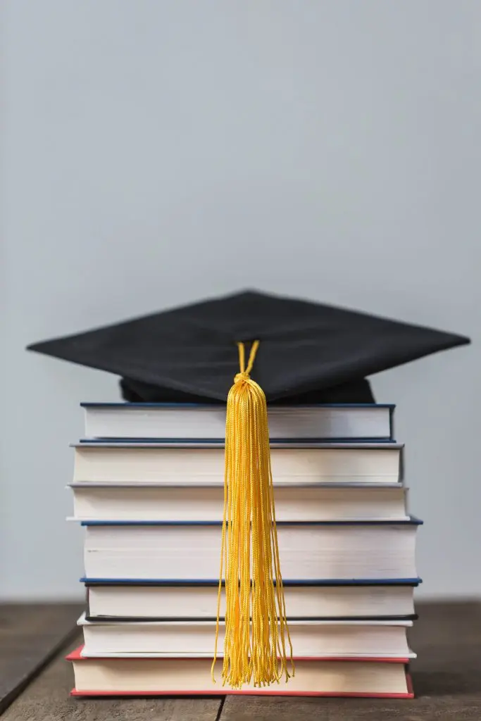 LVN College Textbooks & Graduation Cap for Licensed Vocational Nursing Alumni
